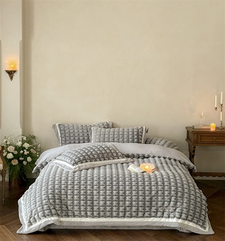 Quilted velvet bedding set with 3D waffle structure and decorative border Stornfield
