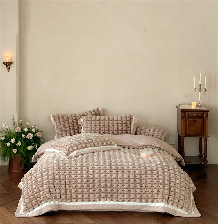 Quilted velvet bedding set with 3D waffle structure and decorative border Stornfield