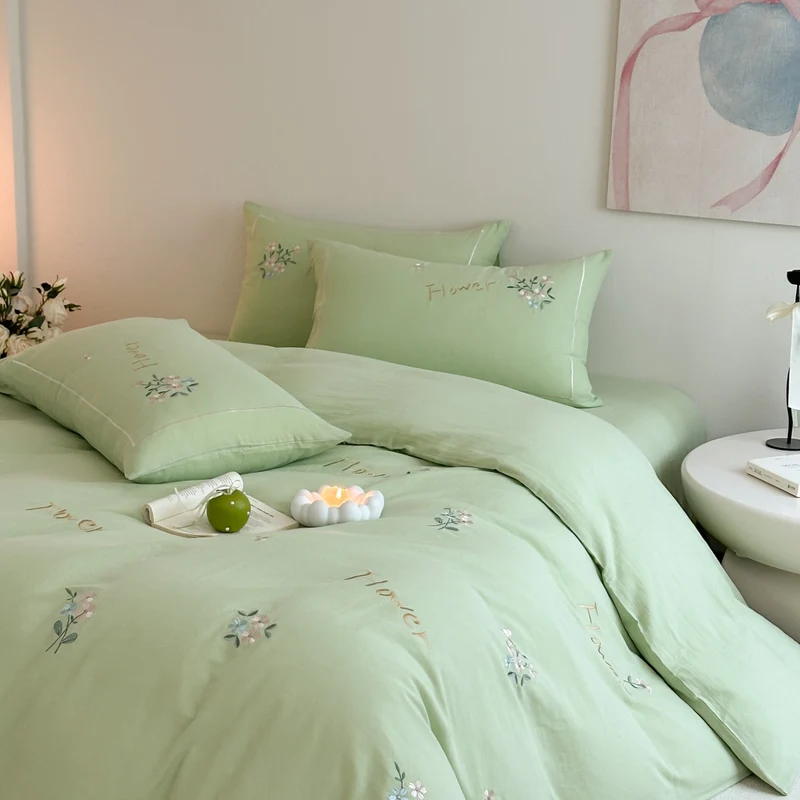 Delicate embroidered cotton bedding set with gentle botanical embroidery and bow ties Stornfield