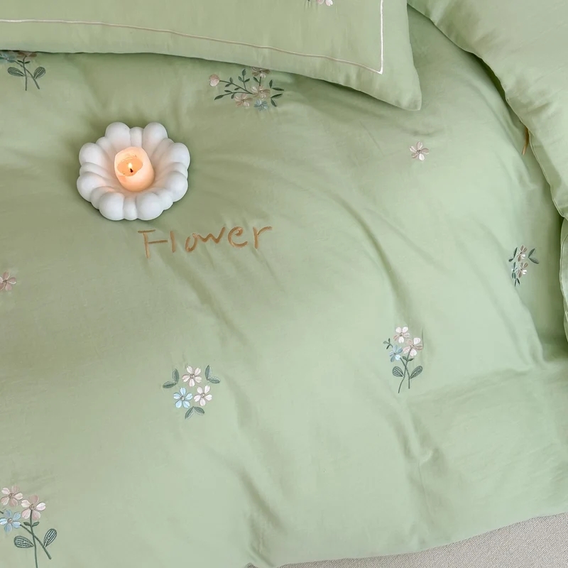 Delicate embroidered cotton bedding set with gentle botanical embroidery and bow ties Stornfield