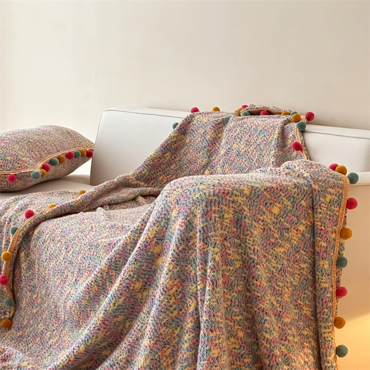 Extra soft cuddly throw blanket with pom-pom trim and mottled chenille relief Stornfield