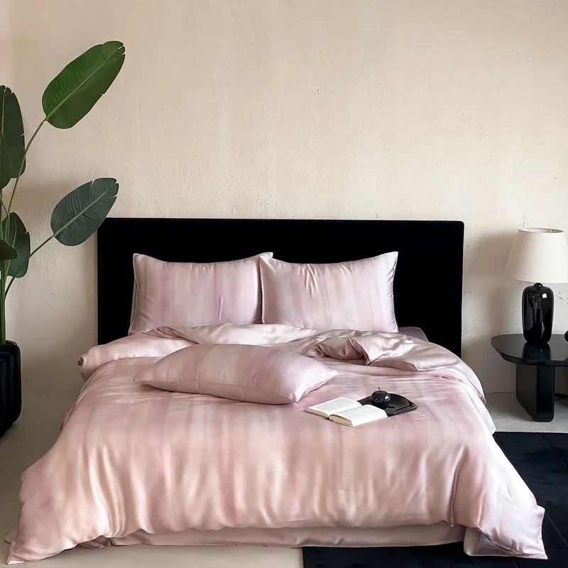 Elegant satin bedding set with silky shiny surface and breathable filling Stornfield