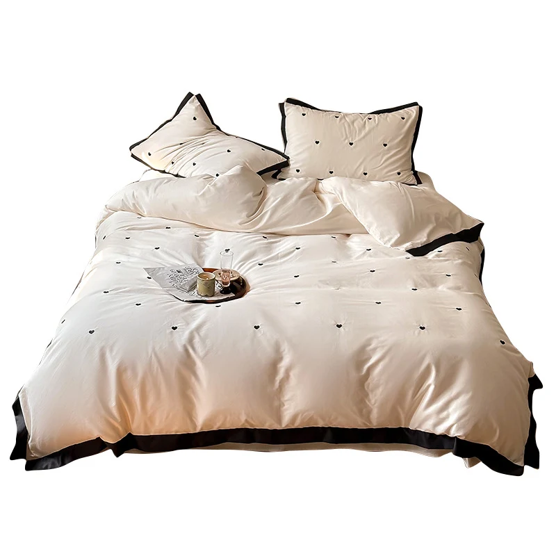 Bedding set made of cotton satin with mini heart embroidery and contrast piping Stornfield