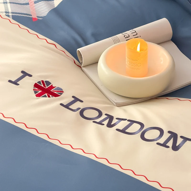 Bedding set in London motif made of cotton satin with check patchwork and embroidered skyline icons Stornfield