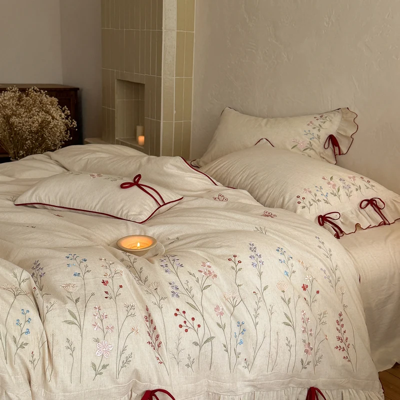 Luxurious linen bedding set with hand-embroidered bamboo and bird motif Stornfield