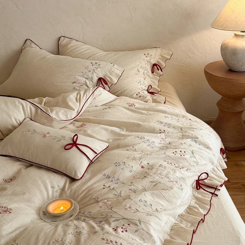 Luxurious linen bedding set with hand-embroidered bamboo and bird motif Stornfield