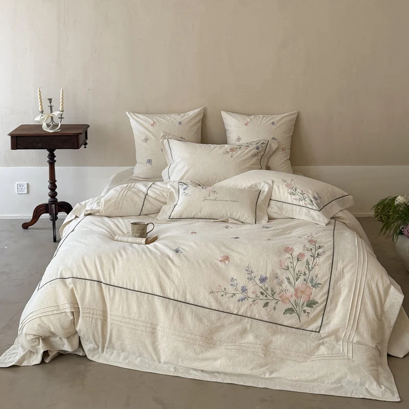 Luxurious linen bedding set with hand-embroidered bamboo and bird motif Stornfield