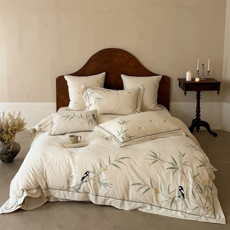 Luxurious linen bedding set with hand-embroidered bamboo and bird motif Stornfield