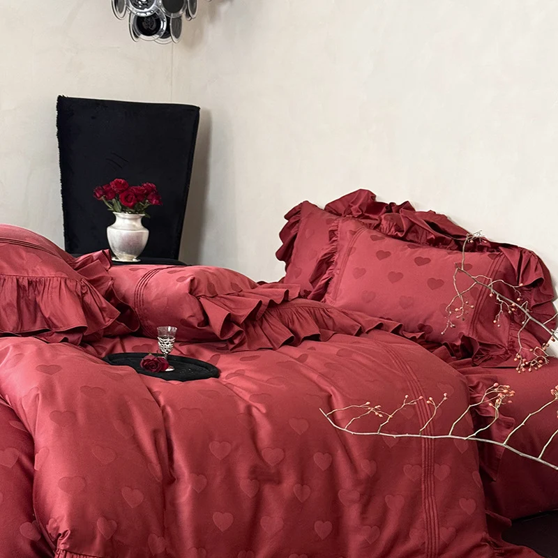 Luxurious satin bedding set with heart jacquard, ruffled frills and hotel closure Stornfield