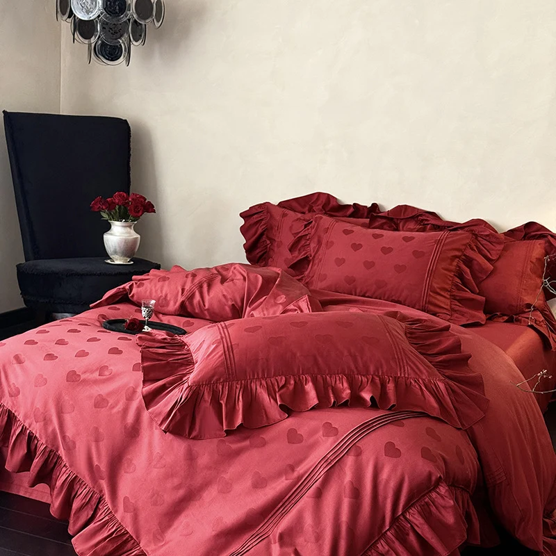 Luxurious satin bedding set with heart jacquard, ruffled frills and hotel closure Stornfield