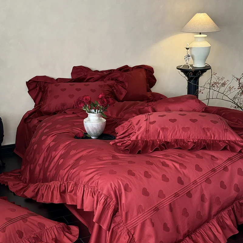 Luxurious satin bedding set with heart jacquard, ruffled frills and hotel closure Stornfield