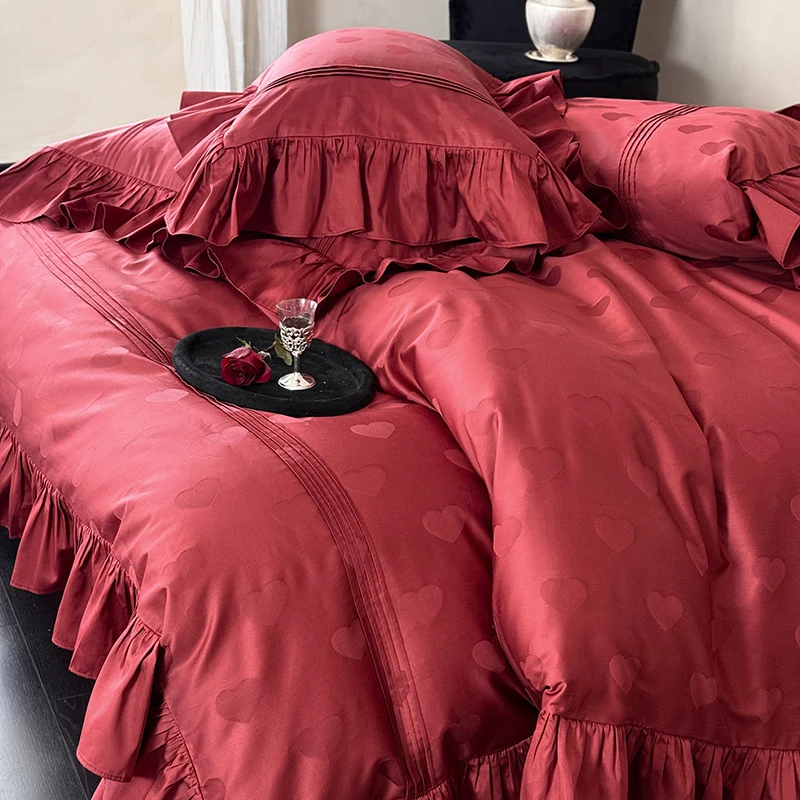 Luxurious satin bedding set with heart jacquard, ruffled frills and hotel closure Stornfield