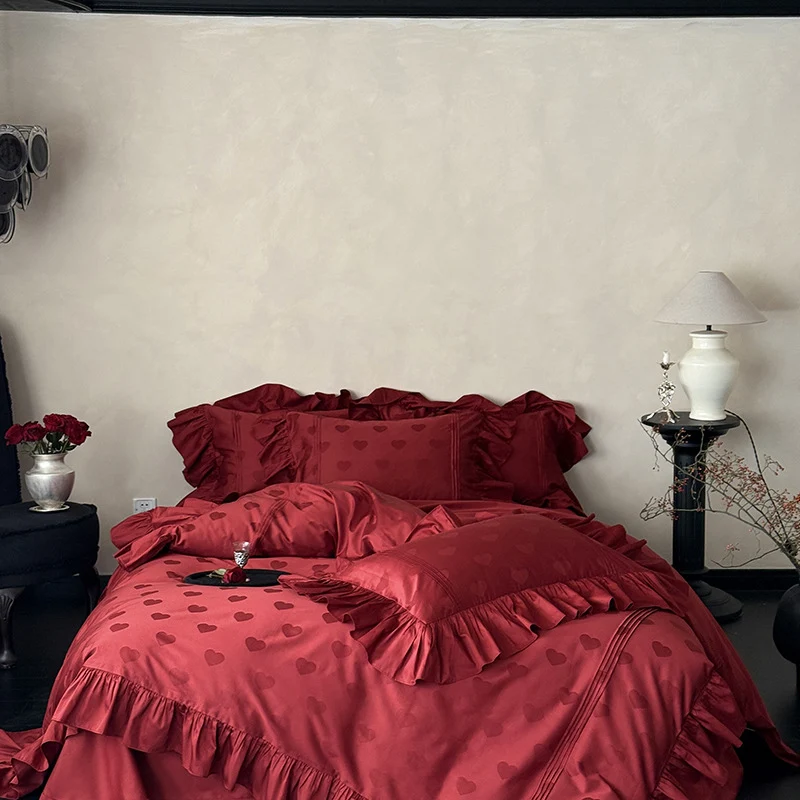 Luxurious satin bedding set with heart jacquard, ruffled frills and hotel closure Stornfield