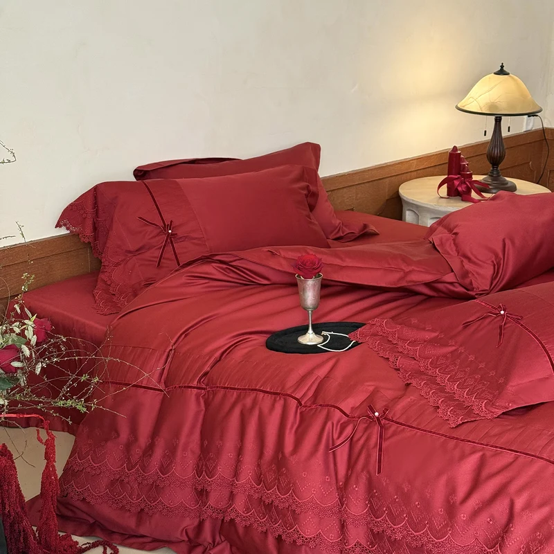 Luxurious bed linen set with lace edging, ruffles, and decorative bows Stornfield