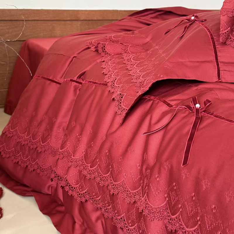 Luxurious bed linen set with lace edging, ruffles, and decorative bows Stornfield