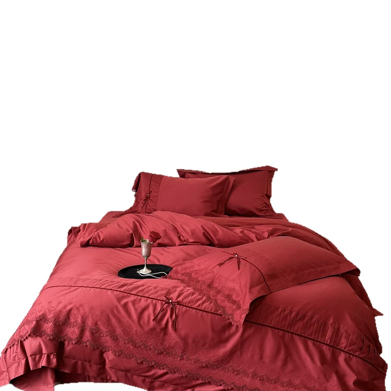 Luxurious bed linen set with lace edging, ruffles, and decorative bows Stornfield