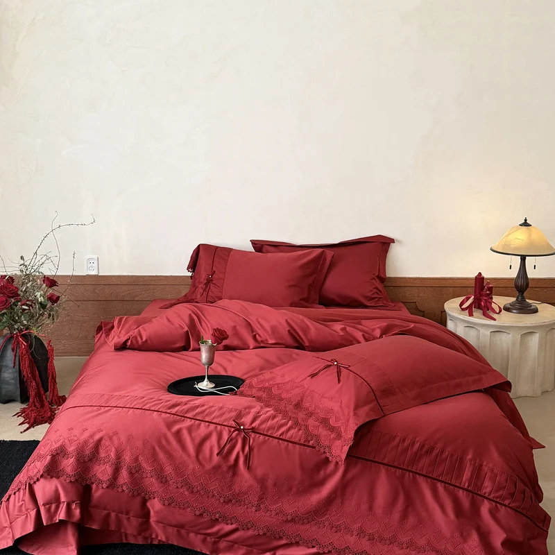 Luxurious bed linen set with lace edging, ruffles, and decorative bows Stornfield