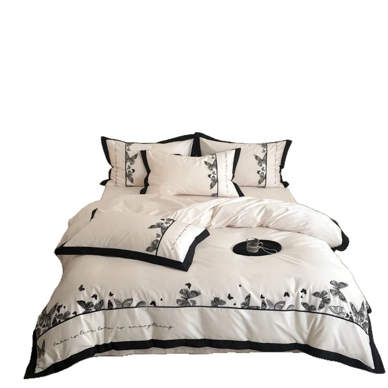 Luxurious cotton satin bedding set with butterfly embroidery and contrasting piping Stornfield
