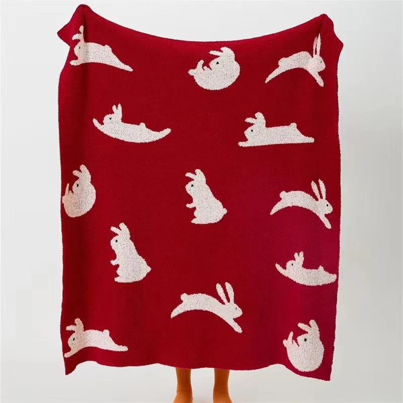 Jacquard knit cuddle blanket with rabbit motifs Stornfield