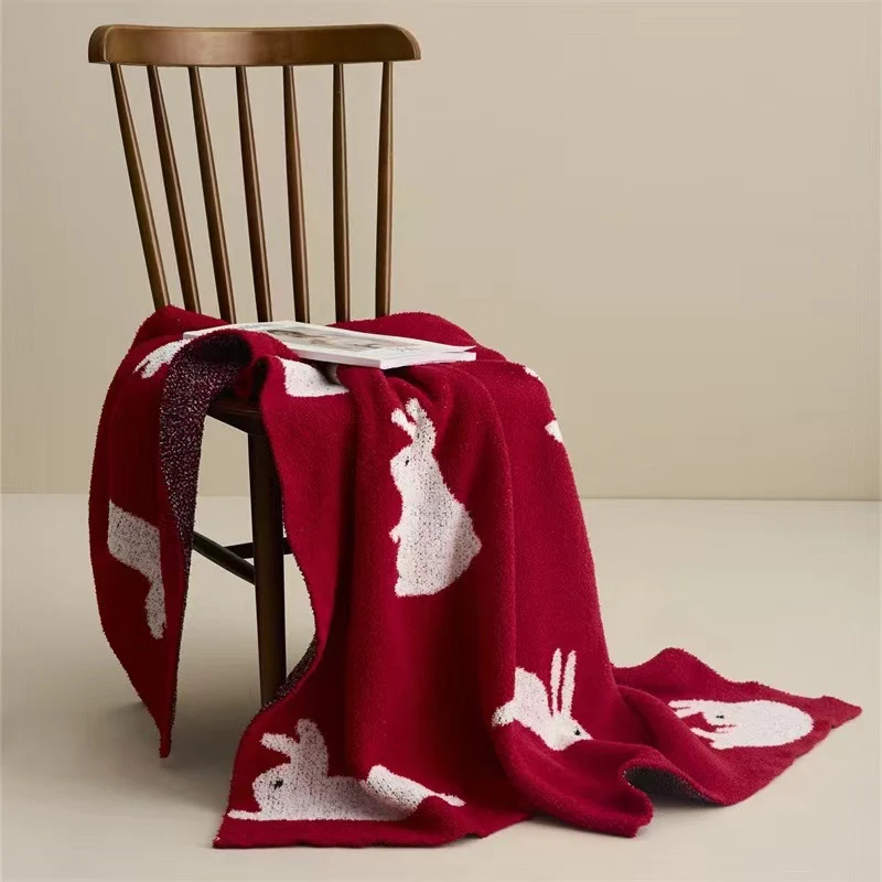Jacquard knit cuddle blanket with rabbit motifs Stornfield