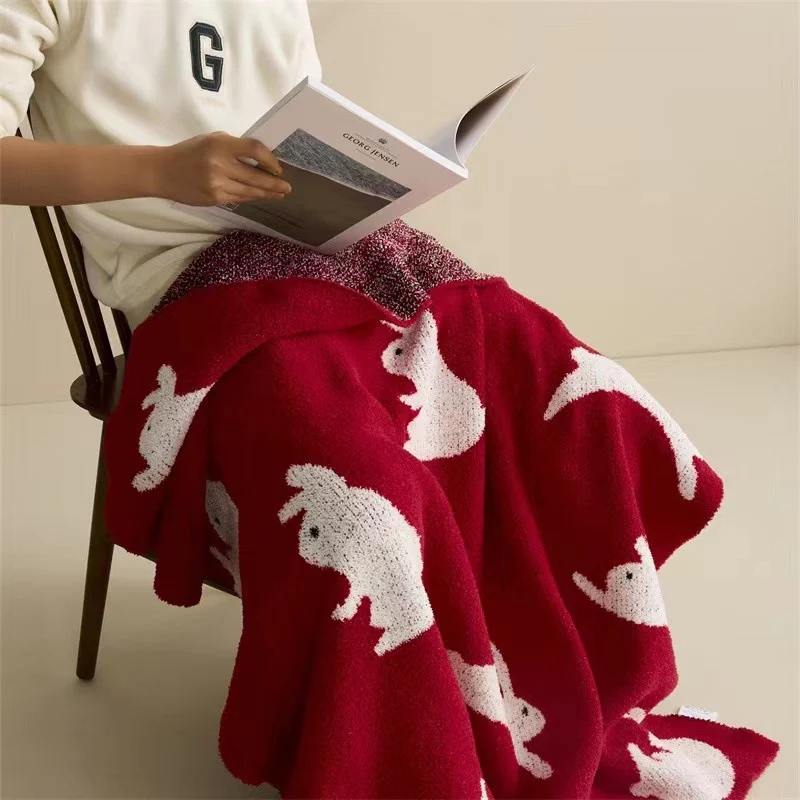 Jacquard knit cuddle blanket with rabbit motifs Stornfield