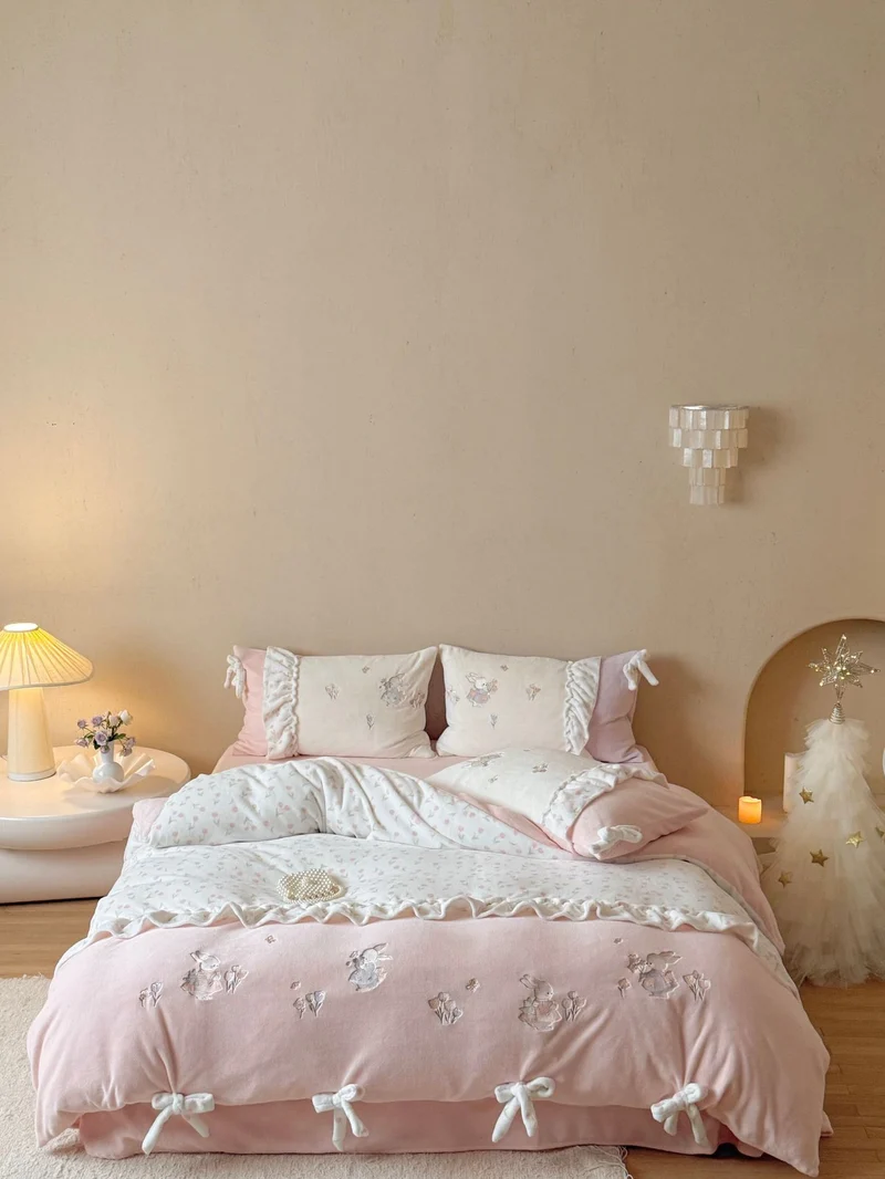 Children's bedding set with ruffles, bows and embroidered rabbit appliqués Stornfield