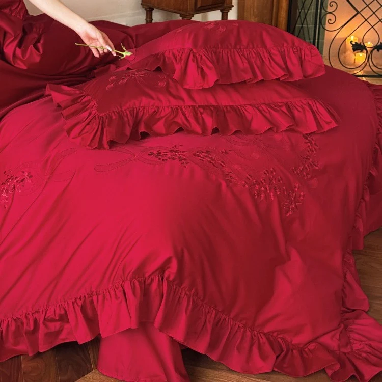Cotton satin bedding set with decorative ruffles and fine relief embroidery Stornfield