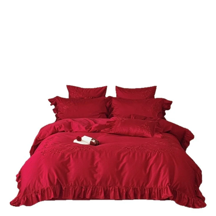Cotton satin bedding set with decorative ruffles and fine relief embroidery Stornfield