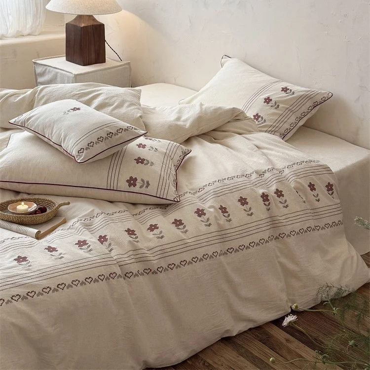Cotton-linen bedding set with embroidered floral border decor Stornfield