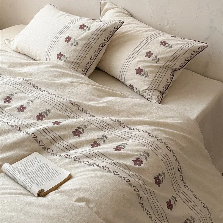 Cotton-linen bedding set with embroidered floral border decor Stornfield