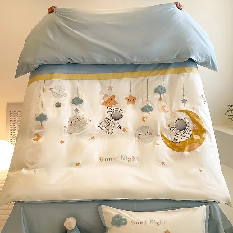 Playful bedding set made of cotton satin with applied cartoon motifs, ruffled frills and decorative pillowcases Stornfield