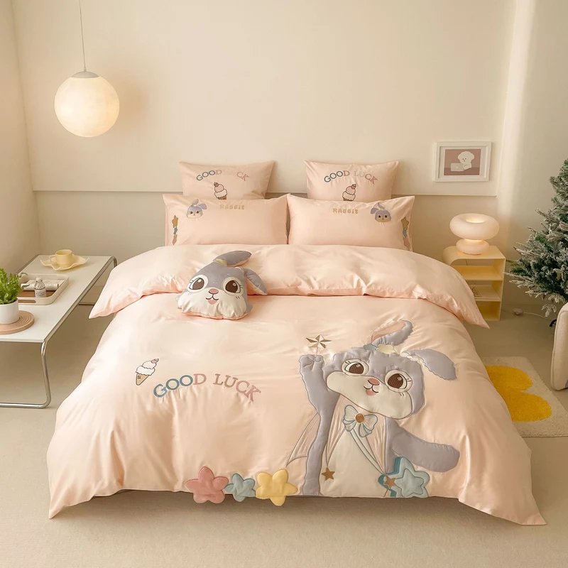 Playful bedding set made of cotton satin with applied cartoon motifs, ruffled frills and decorative pillowcases Stornfield
