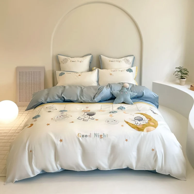Playful bedding set made of cotton satin with applied cartoon motifs, ruffled frills and decorative pillowcases Stornfield