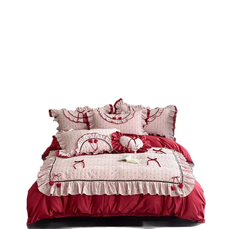Romantic cotton bedding set with ruffle, heart embroidery and decorative pillow Stornfield