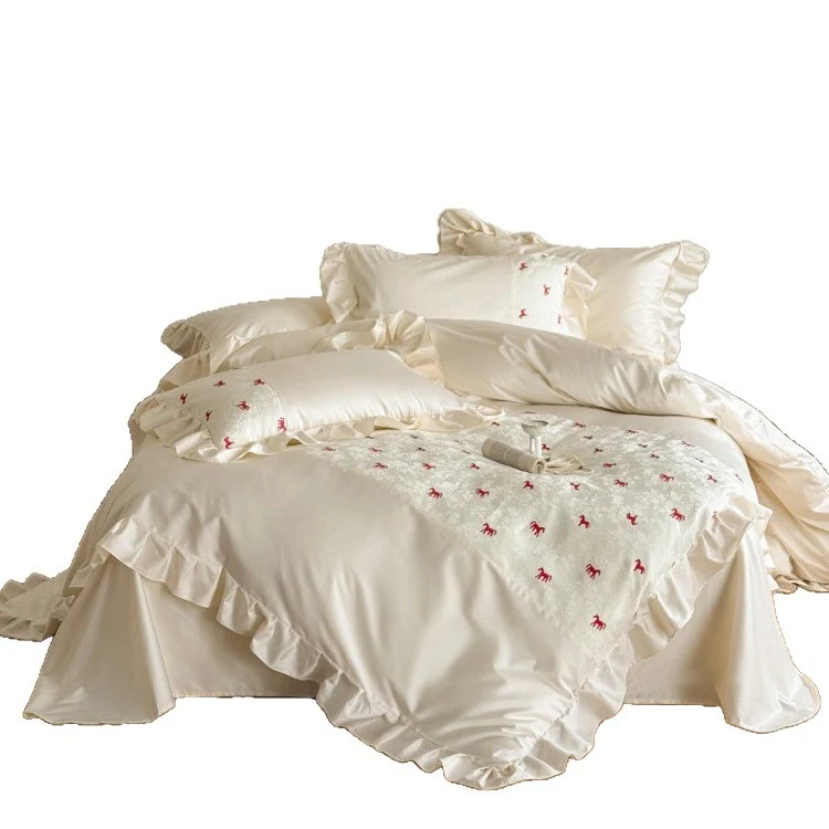 Romantic cotton satin bed linen set with ruffle, decorative panel and delicate animal print Stornfield