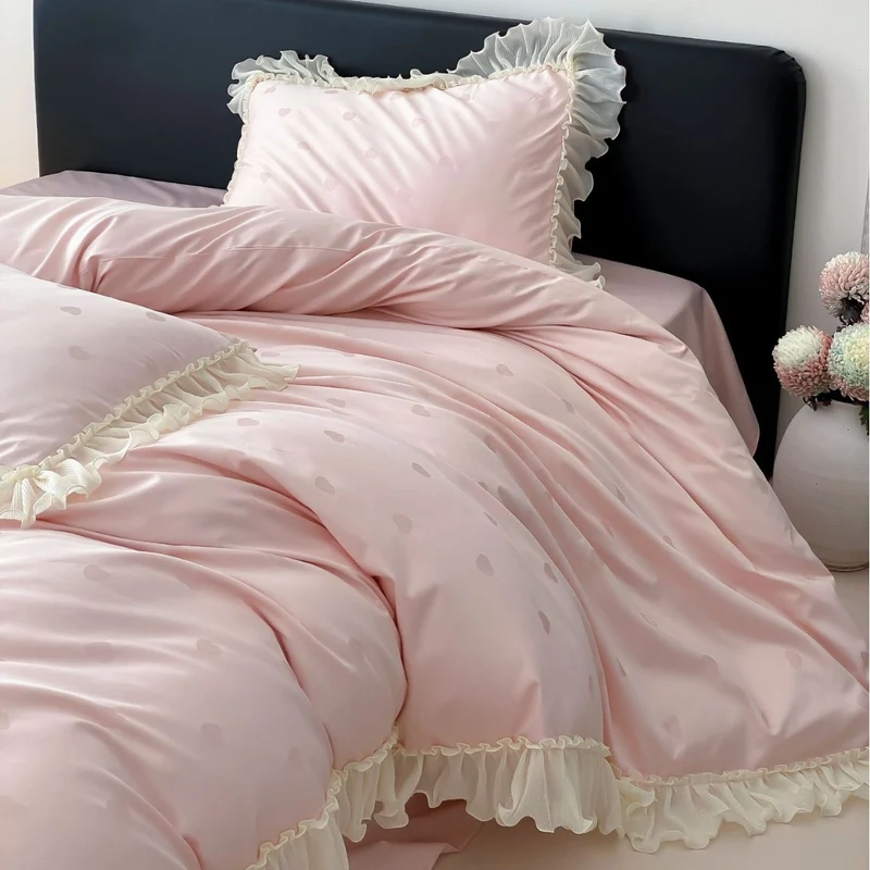Luxurious satin bedding set with ruffles and subtle heart print Stornfield