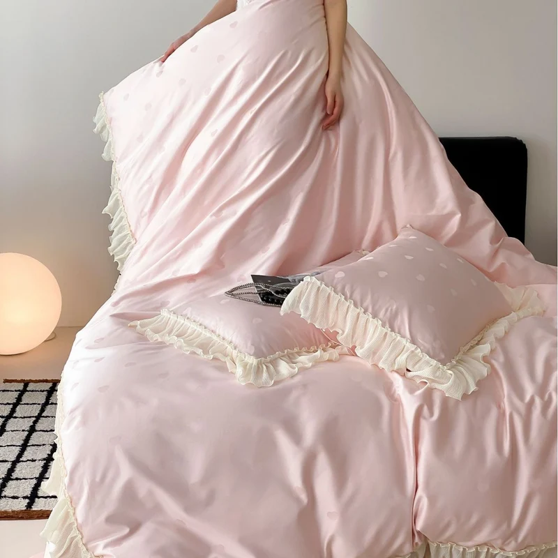 Luxurious satin bedding set with ruffles and subtle heart print Stornfield