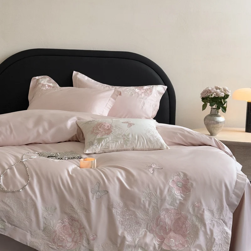 Luxurious satin bedding set with floral embroidery and silk-soft finish Stornfield