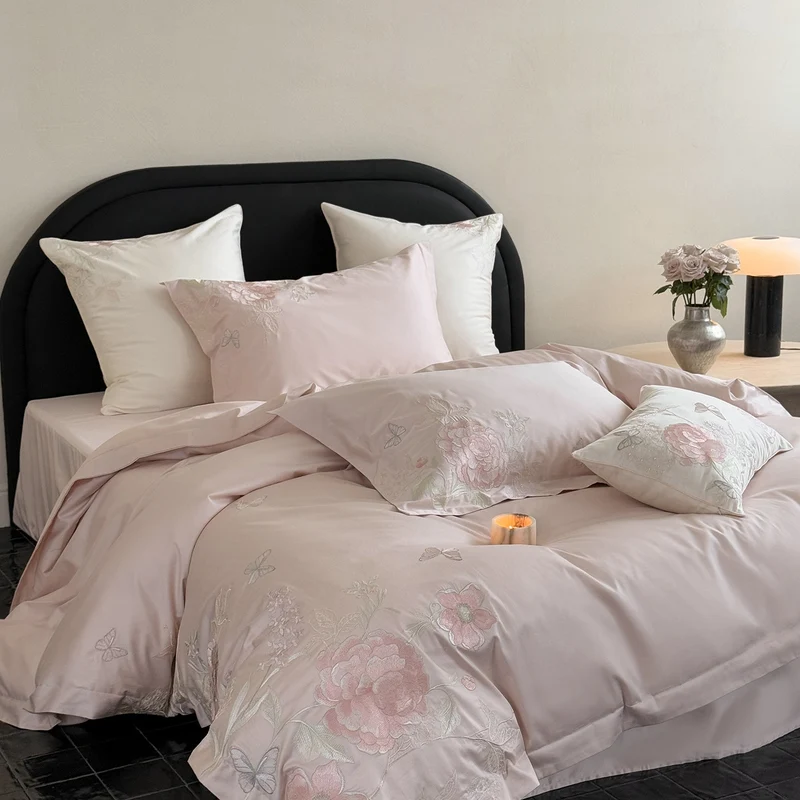 Luxurious satin bedding set with floral embroidery and silk-soft finish Stornfield