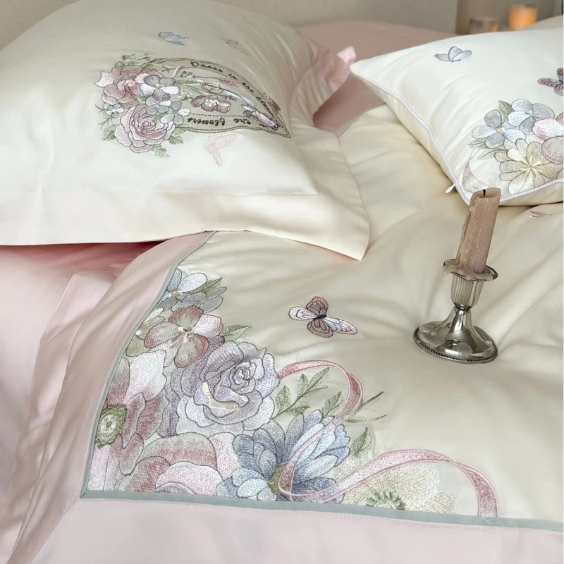 Luxurious floral embroidered cotton satin bedding set with ruffle and decorative pillow Stornfield