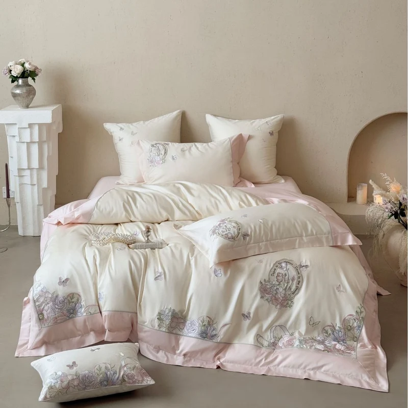 Luxurious floral embroidered cotton satin bedding set with ruffle and decorative pillow Stornfield