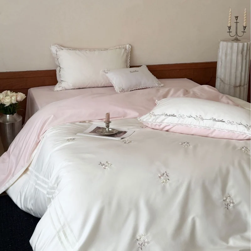 Luxurious fine cotton satin bedding set with delicate flower embroidery and frill pillow Stornfield