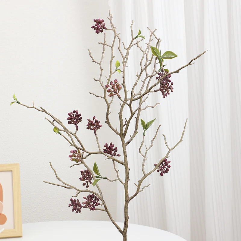 Dekorativer Kunstzweig mit detailverliebten Blüten Karnz
