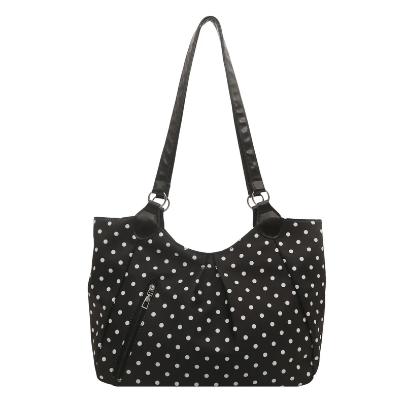 Stylische gepunktete Schultertasche