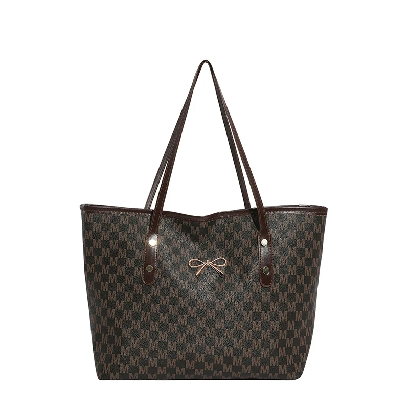 Stylische Flockmuster-Tasche mit dekorativem Bogen