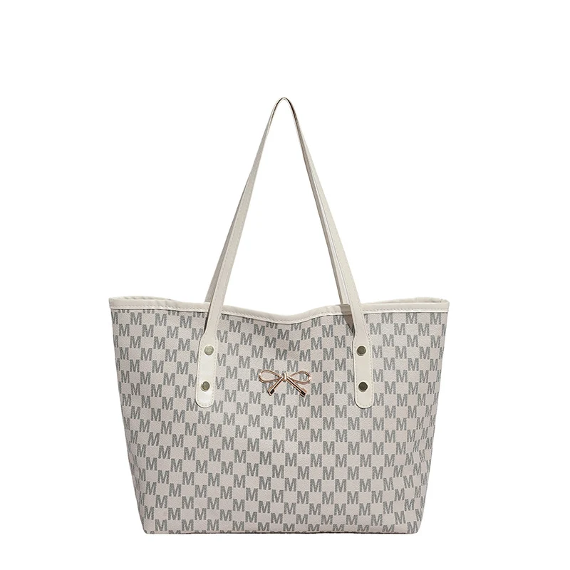 Stylische Flockmuster-Tasche mit dekorativem Bogen