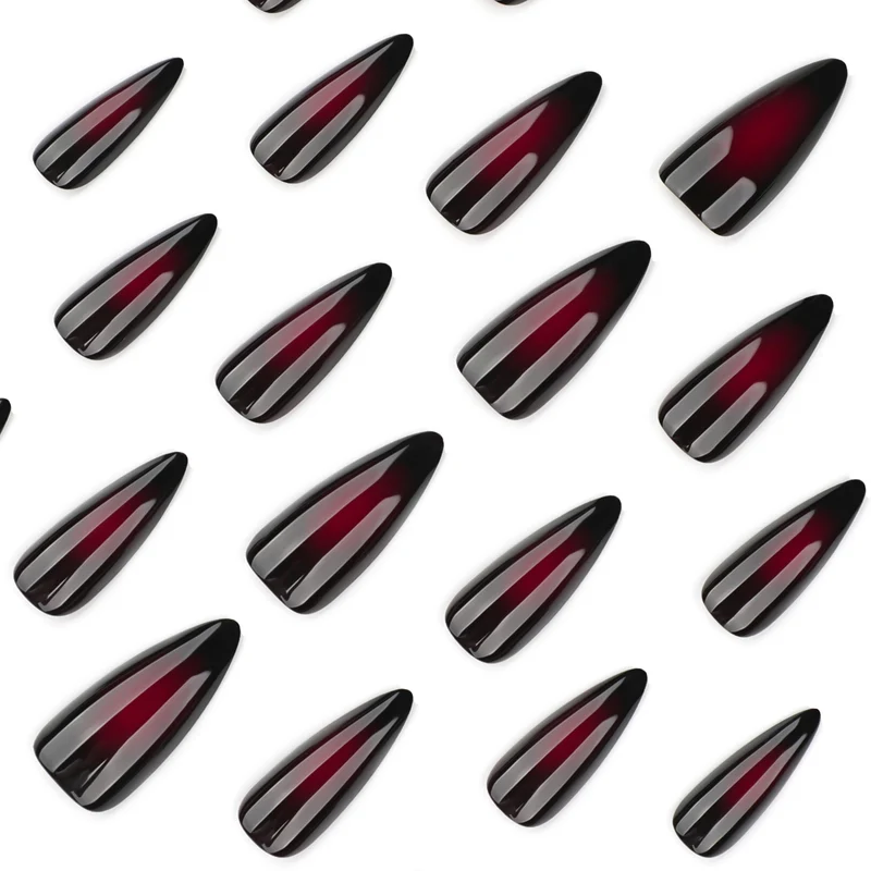 Kunstvolle Stiletto-Nägel mit ombre Effekt Karnz