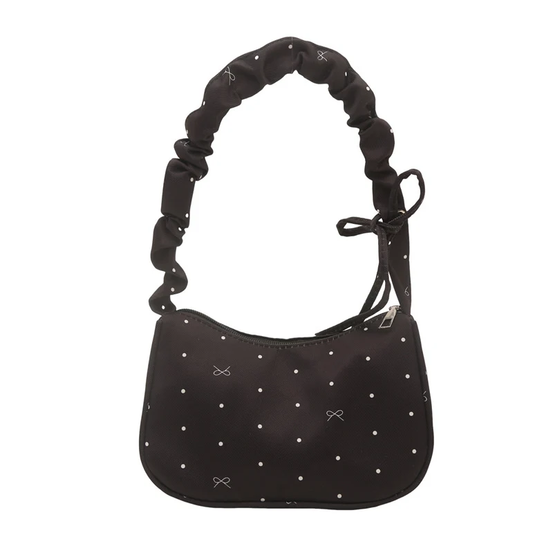 Süßes, mit Schleifen verziertes Mini-Handtasche