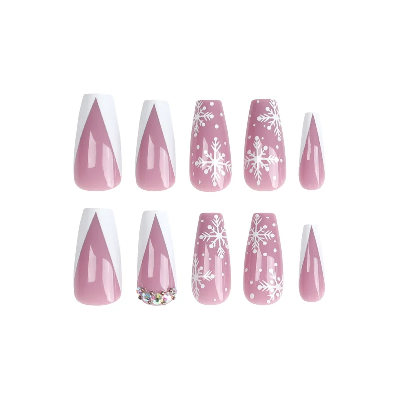 Kunstvolle Nagelverlängerungen mit Schneeflocken-Design und Glitzerakzenten Karnz