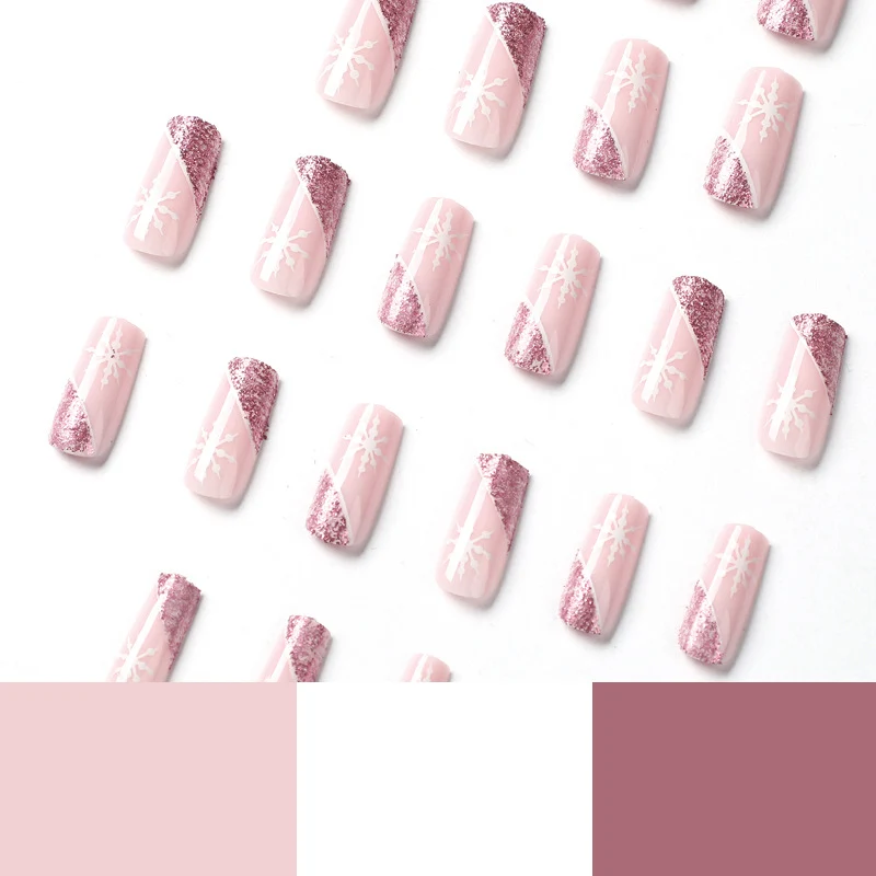 Kunstvolle Nagelverlängerungen mit festlichem Glitzer und Schneeflockendesign Karnz